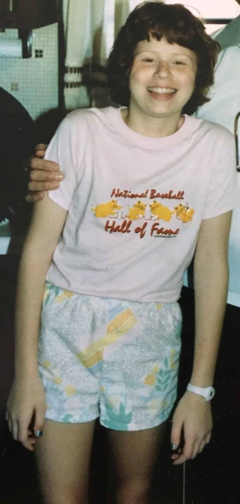 author as a kid wearing a baseball hall of fame t-shirt 